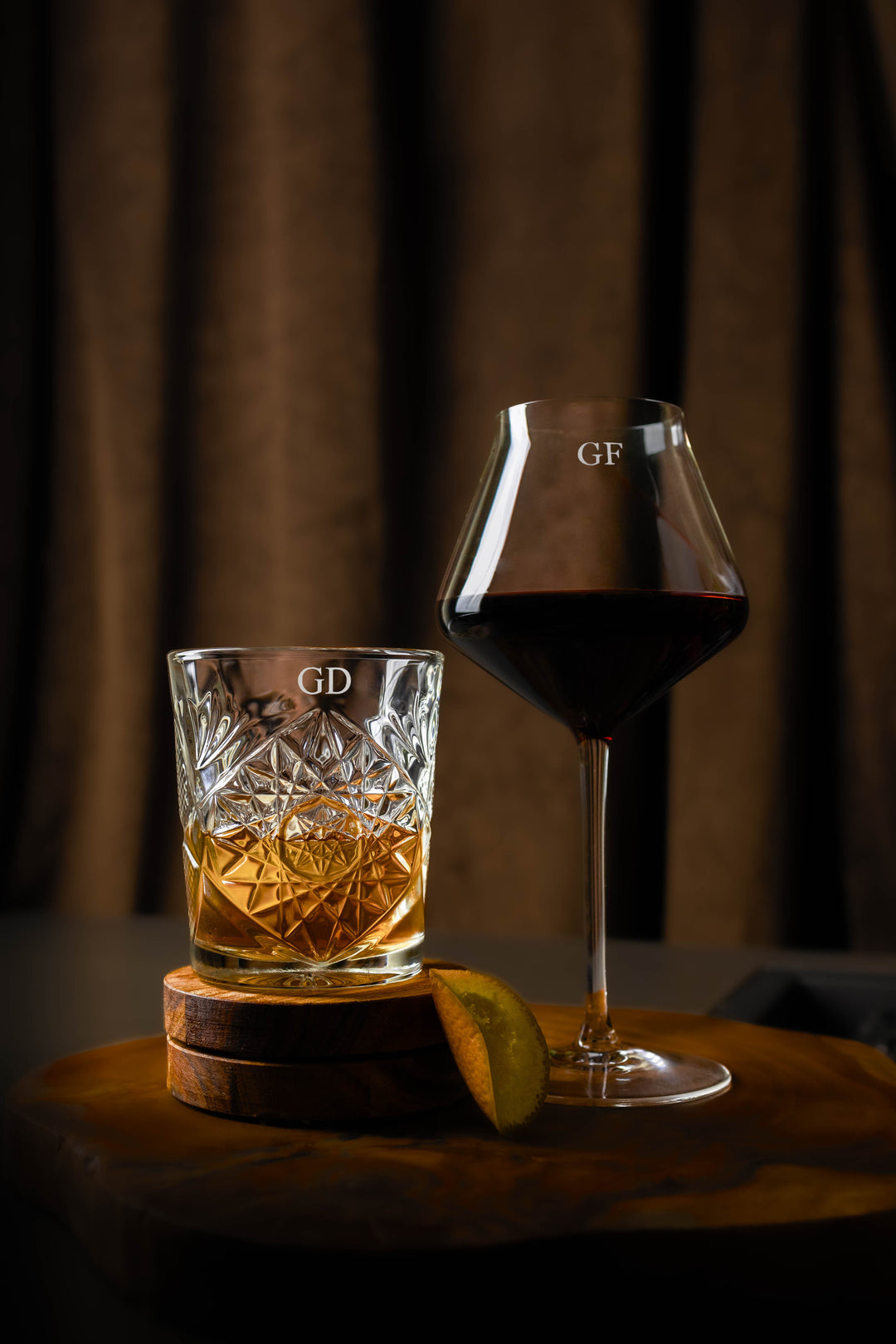Set of two personalised glasses including a whiskey glass and a red wine glass