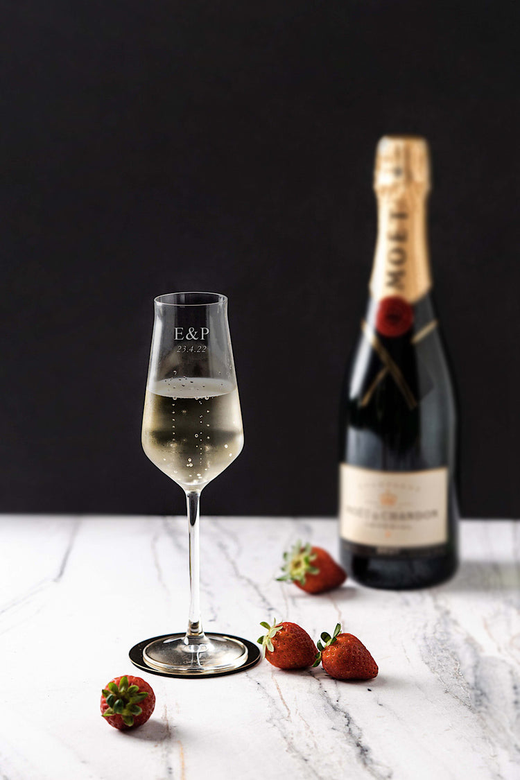 wedding date engraved on a champagne flute