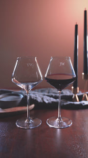 A set of personalised wine glasses with initials engraved